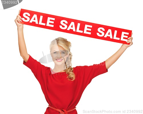 Image of lovely woman in red dress with sale sign