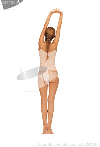Image of rear view of beautiful woman in cotton undrewear