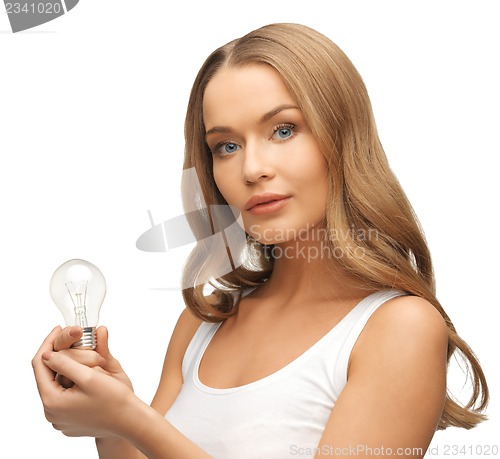 Image of woman with energy saving bulb