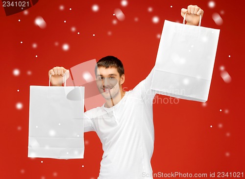 Image of man with shopping bags