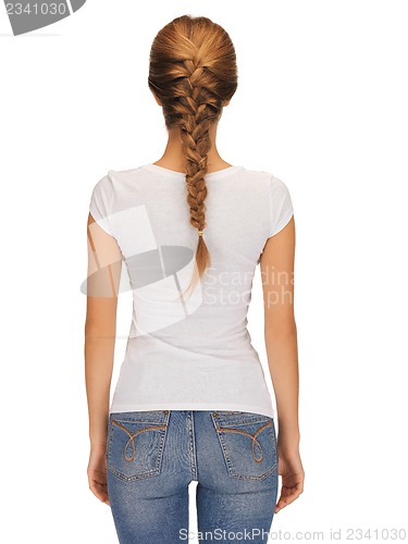 Image of rear view of woman in blank white t-shirt