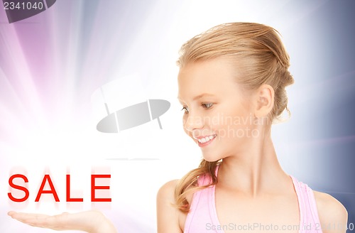 Image of sale word on the palm