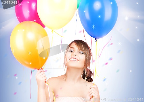 Image of happy teenage girl with balloons