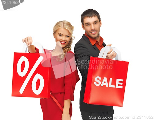 Image of man and woman with shopping bag