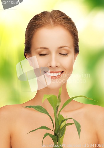 Image of woman with sprout