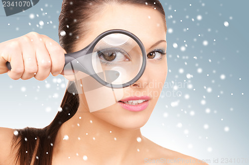 Image of woman with magnifying glass