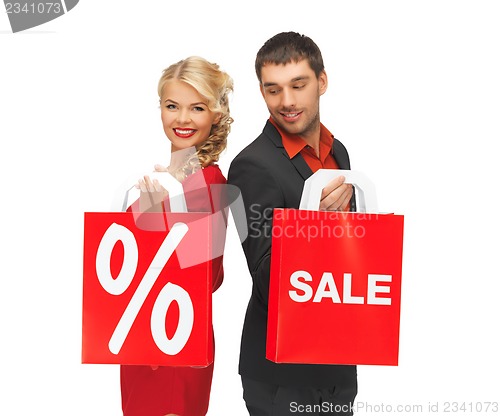 Image of man and woman with shopping bag