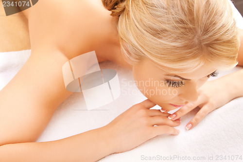 Image of beautiful woman in spa salon