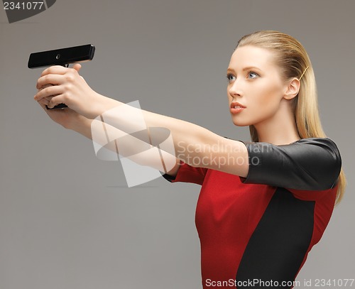 Image of futuristic woman with gadget