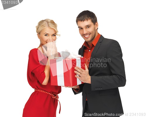 Image of man and woman with present