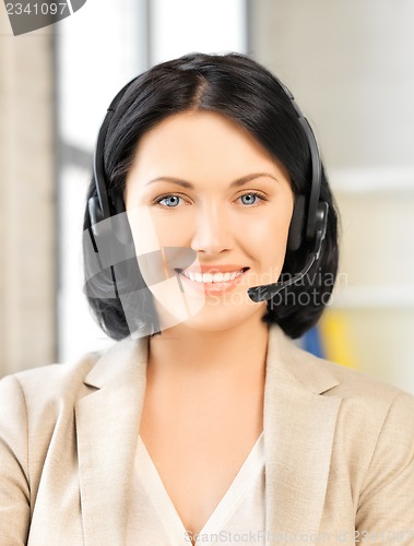 Image of friendly female helpline operator