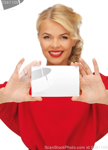 Image of lovely woman in red dress with note card