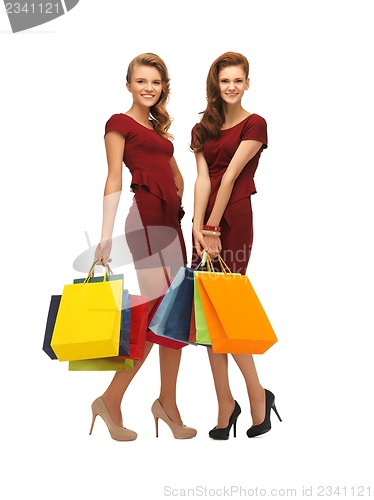 Image of two teenage girls with shopping bags