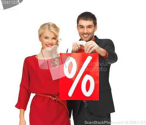 Image of man and woman with shopping bag