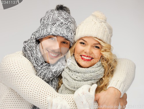 Image of family couple in a winter clothes