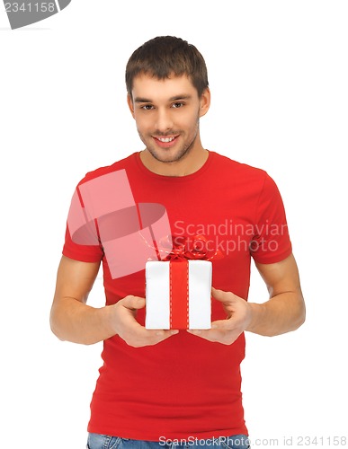 Image of handsome man with a gift