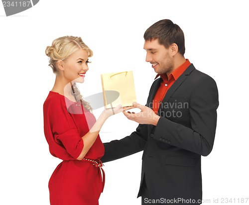 Image of man and woman with present