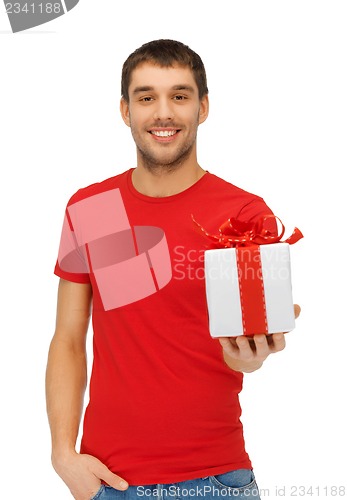 Image of handsome man with a gift