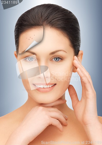 Image of face and hands of beautiful woman