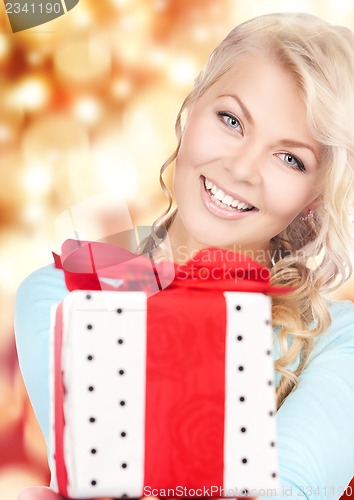 Image of happy woman with gift box