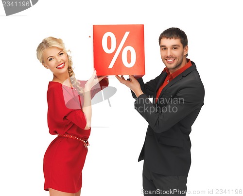 Image of man and woman with percent sign