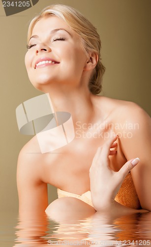 Image of beautiful woman in water