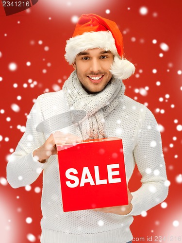 Image of handsome man in christmas hat