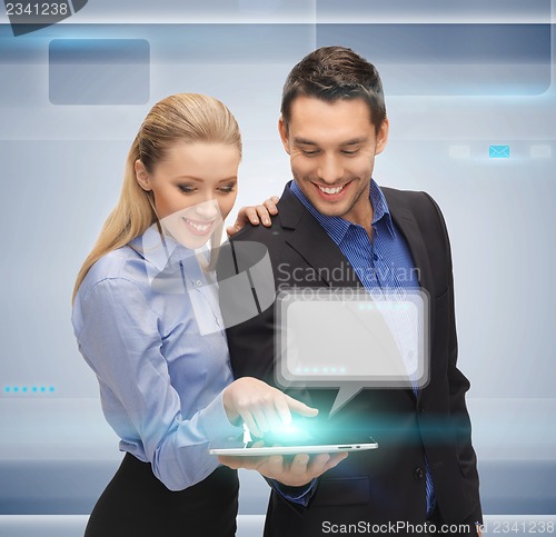 Image of man and woman with tablet pc