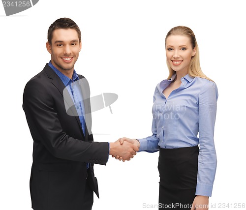 Image of man and woman shaking their hands