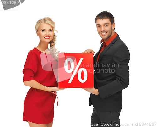 Image of man and woman with percent sign