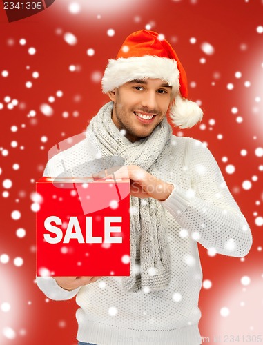 Image of handsome man in christmas hat