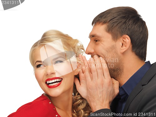 Image of man and woman spreading gossip