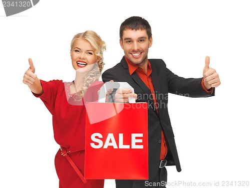 Image of man and woman with shopping bag