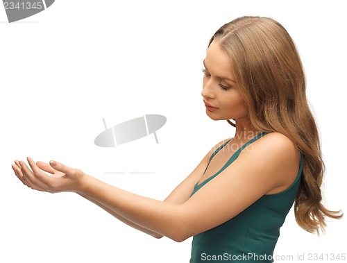 Image of woman holding something on the palms