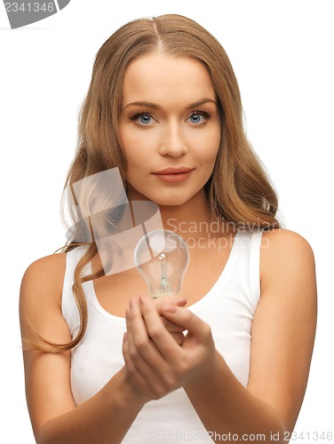 Image of woman with energy saving bulb