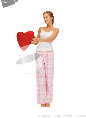 Image of woman in cotton pajamas with big heart