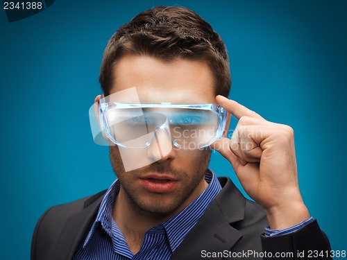 Image of businessman with digital glasses