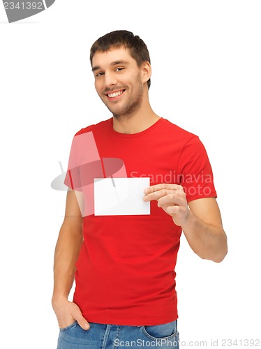 Image of handsome man with note card