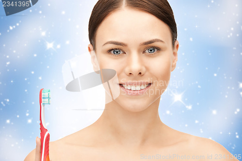 Image of beautiful woman with toothbrush