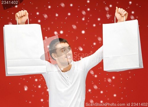 Image of man with shopping bags