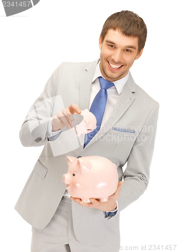 Image of man with two piggy banks