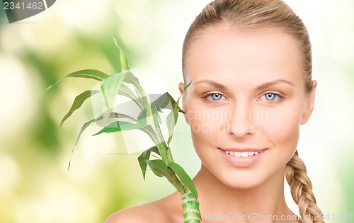 Image of woman with sprout