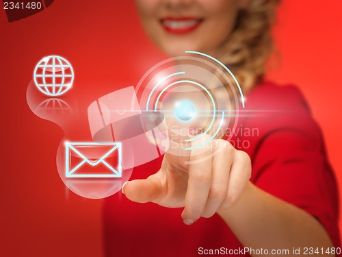 Image of woman in red dress pressing virtual button