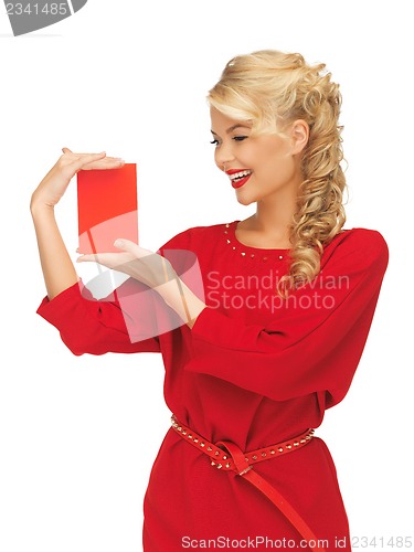 Image of lovely woman in red dress with note card