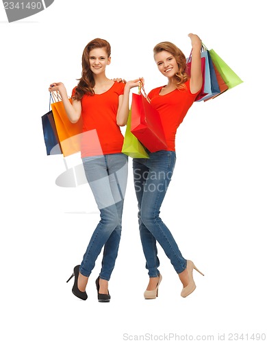 Image of two teenage girls with shopping bags