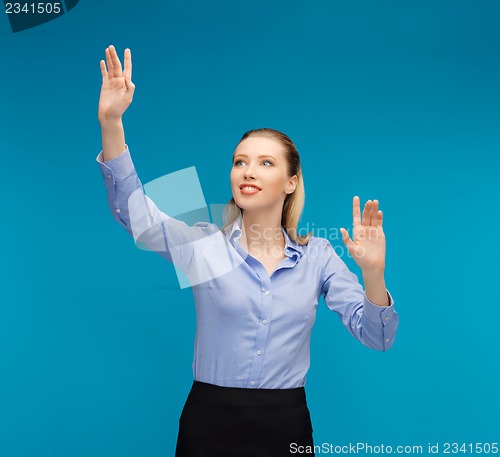 Image of woman working with something imaginary