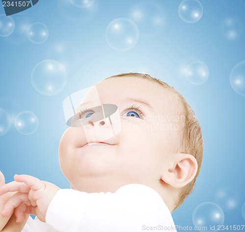 Image of baby with soap bubbles