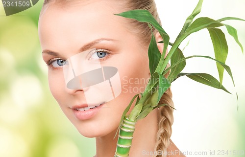 Image of woman with sprout