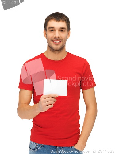 Image of handsome man with note card