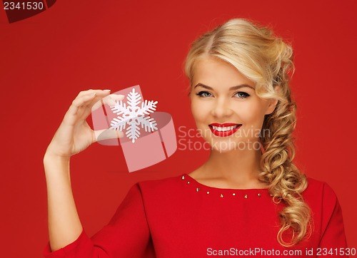 Image of lovely woman in red dress with snowflake